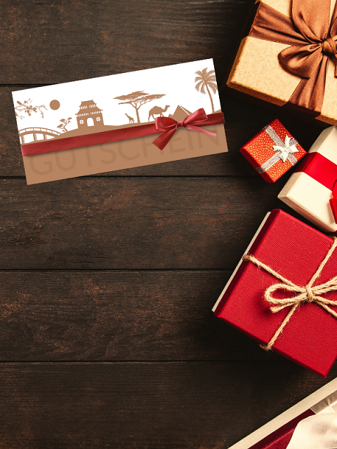Erfurt REISEBÜRO Wache Weihnachtsgeschenke 2022 Reise Verschenken Urlaub Verschenken Symbolbild Weihnachtsgeschenke 2022 REISEBÜRO Wache Erfurt, zu sehen sind Geschenke und Gutschein